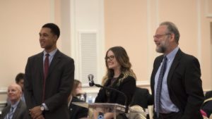UNC-CH students Malik Jabati and Brenee Goforth and PPE Professor Geoffrey Sayre-McCord speak to the UNC Board of Trustees during a February meeting. | Photo by Jon Gardiner/Courtesy of UNC-CH University Gazette 