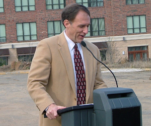 Jim Anthony speaks at a commercial real estate project.