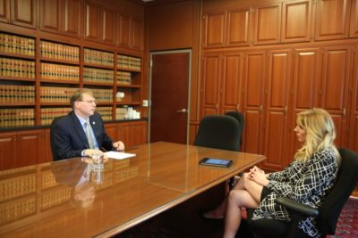 N.C. Chief Justice Mark Martin speaks with CJ Associate Editor Kari Travis in July 2017 at his Raleigh office. | Photo and caption courtesy of Carolina Journal. Photo credit Don Carrington.